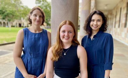 Three UQ researchers in the Great Court 
